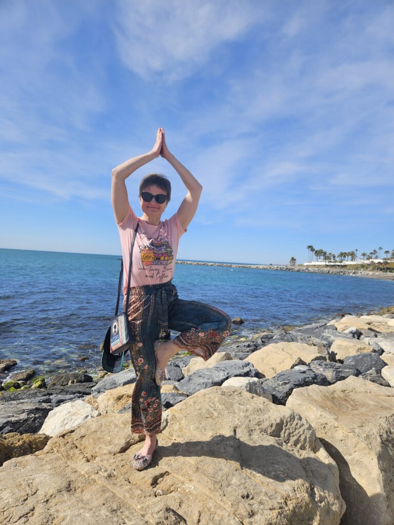 Lady standing in tree pose